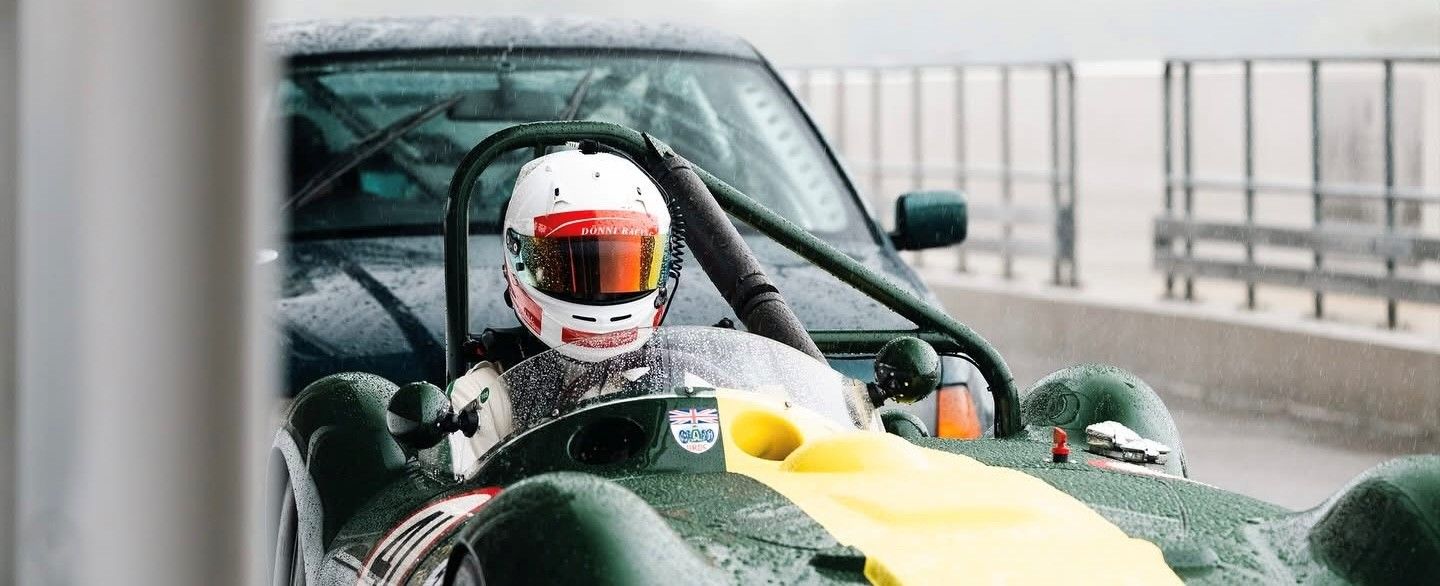 Lister Maserati in the rain with Robin Dönni driving