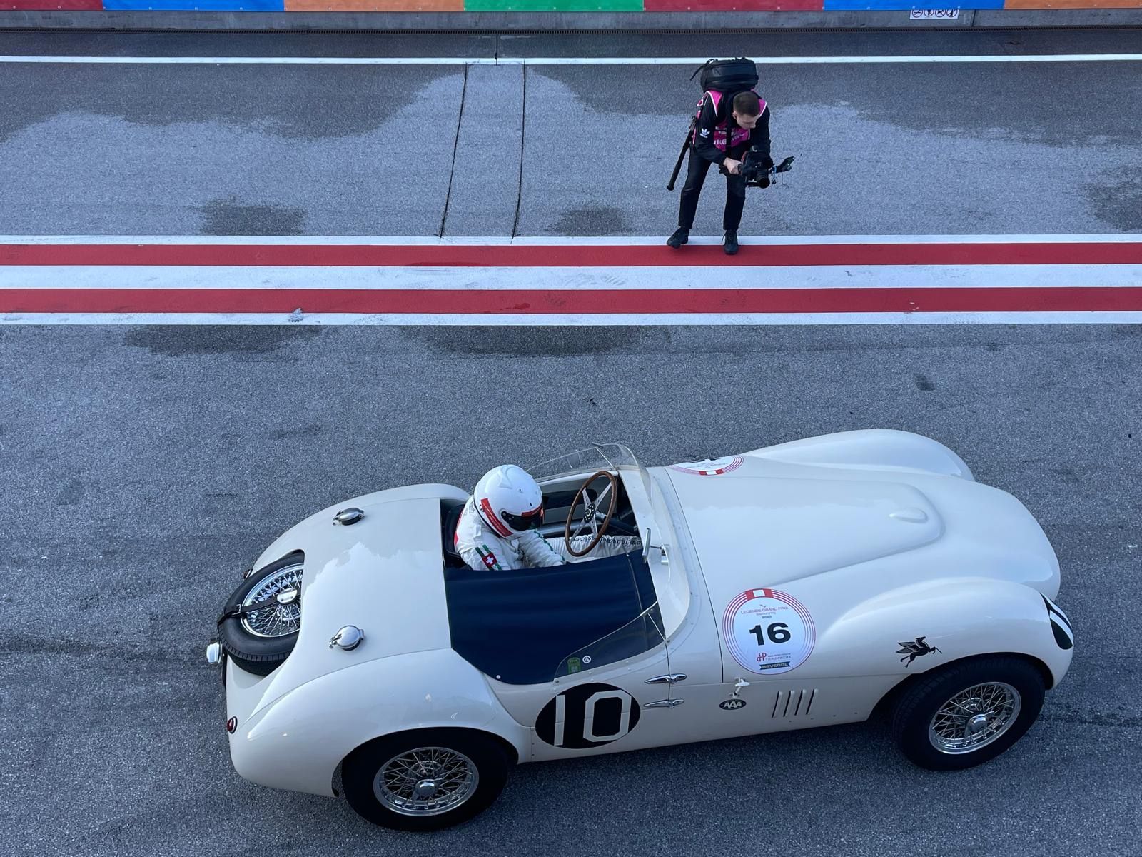 Aerial view of the Jaguar in the Goodwood pit lane